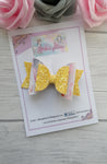 Glitter and leatherette bow