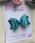 Holographic blue bow